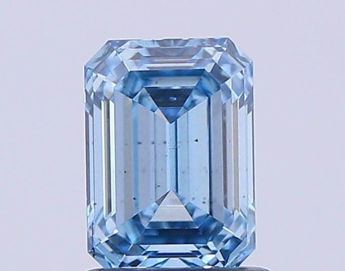 Loose Diamond - EMERALD 1.06ct Fancy Vivid Blue VS2: Loose Diamond - EMERALD 1.06ct Fancy Vivid Blue VS2 Source: This is a real non-mined Diamond that has been grown in a lab Shape: EMERALD Carats: 1.06 Color: Fancy Vivid Blue Certification: NONE Video: