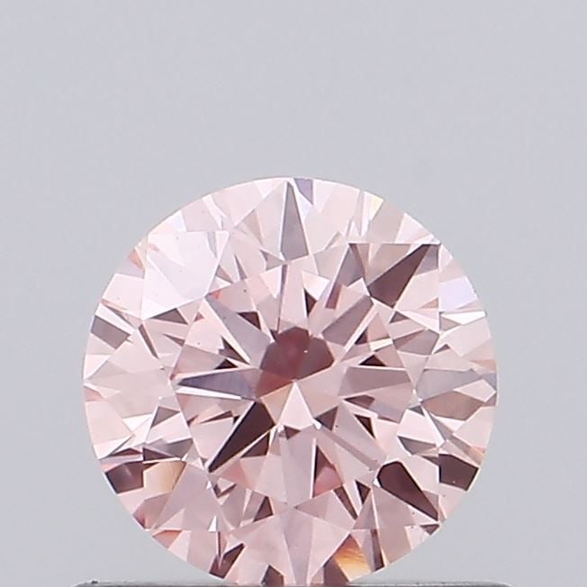 Ideal Loose Diamond - ROUND 0.47ct Fancy Vivid Pink VS1: Ideal Loose Diamond - ROUND 0.47ct Fancy Vivid Pink VS1 Source: This is a real non-mined Diamond that has been grown in a lab Shape: ROUND Carats: 0.47 Color: Fancy Vivid Pink Certification: IGI Video