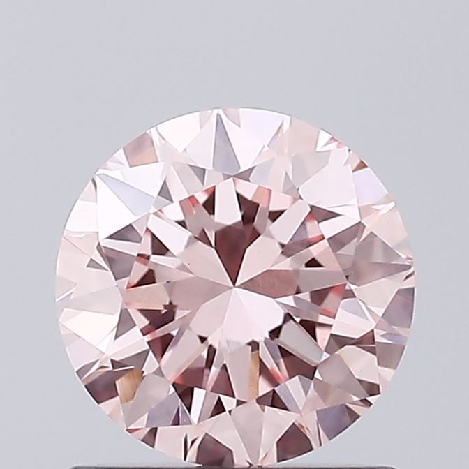 Loose Diamond - ROUND 0.81ct Fancy Intense Pink VVS2: Loose Diamond - ROUND 0.81ct Fancy Intense Pink VVS2 Source: This is a real non-mined Diamond that has been grown in a lab Shape: ROUND Carats: 0.81 Color: Fancy Intense Pink Certification: IGI PLEASE