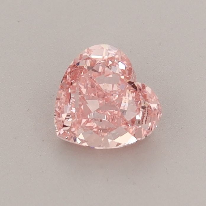 Loose Diamond - HEART 0.54ct Fancy Vivid Pink VS1: Loose Diamond - HEART 0.54ct Fancy Vivid Pink VS1 Source: This is a real non-mined Diamond that has been grown in a lab Shape: HEART Carats: 0.54 Color: Fancy Vivid Pink Certification: IGI Video: