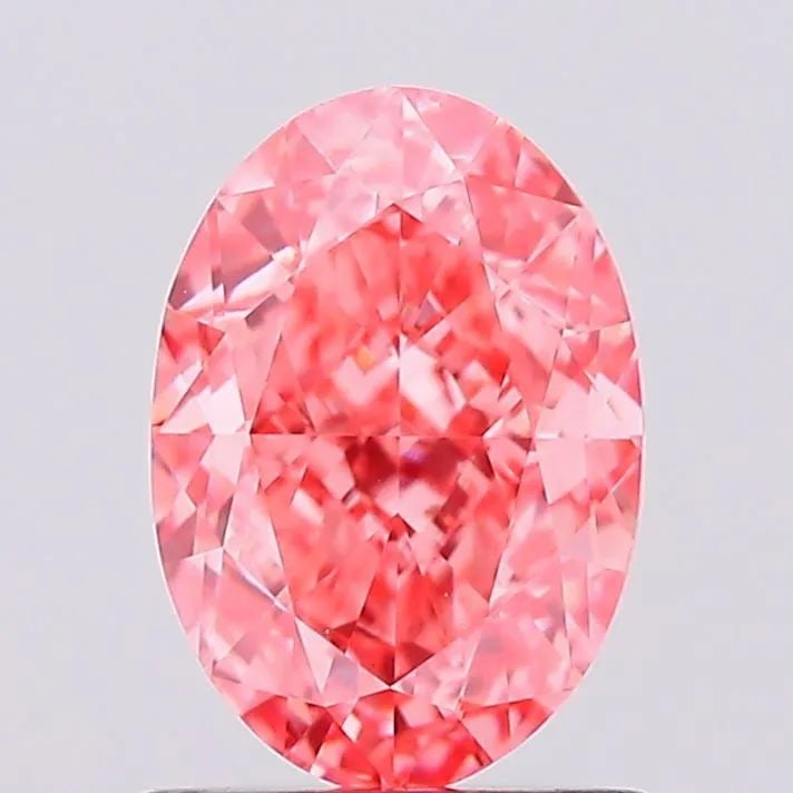 Loose Diamond - OVAL 1.21ct Fancy Vivid Pink VS2: Loose Diamond - OVAL 1.21ct Fancy Vivid Pink VS2 Source: This is a real non-mined Diamond that has been grown in a lab Shape: OVAL Carats: 1.21 Color: Fancy Vivid Pink Certification: IGI Video: