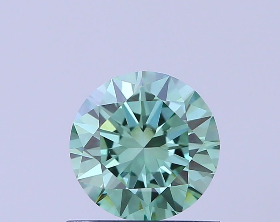 Loose Diamond - ROUND 0.72ct Fancy Vivid Green VVS2: Loose Diamond - ROUND 0.72ct Fancy Vivid Green VVS2 Source: This is a real non-mined Diamond that has been grown in a lab Shape: ROUND Carats: 0.72 Color: Fancy Vivid Green Certification: IGI Video: