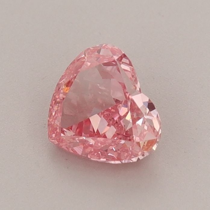 Loose Diamond - HEART 0.71ct Fancy Vivid Pink VS1: Loose Diamond - HEART 0.71ct Fancy Vivid Pink VS1 Source: This is a real non-mined Diamond that has been grown in a lab Shape: HEART Carats: 0.71 Color: Fancy Vivid Pink Certification: IGI PLEASE NOTE