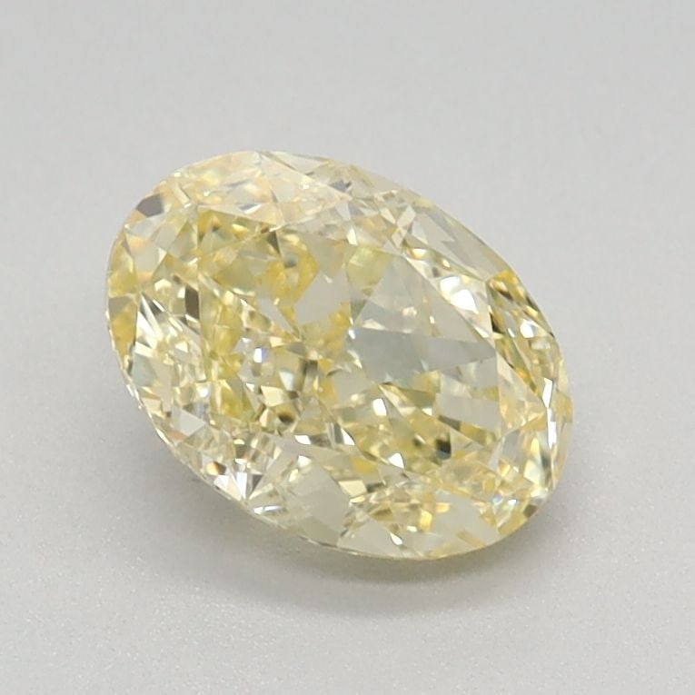 Loose Diamond - OVAL 0.88ct Fancy Yellow VS1: Loose Diamond - OVAL 0.88ct Fancy Yellow VS1 Source: This is a real non-mined Diamond that has been grown in a lab Shape: OVAL Carats: 0.88 Color: Fancy Yellow Certification: IGI Video: