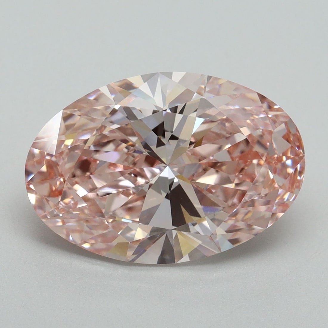 Loose Diamond - OVAL 5.11ct Fancy Intense Pink VVS2: Loose Diamond - OVAL 5.11ct Fancy Intense Pink VVS2 Source: This is a real non-mined Diamond that has been grown in a lab Shape: OVAL Carats: 5.11 Color: Fancy Intense Pink Certification: IGI Video: