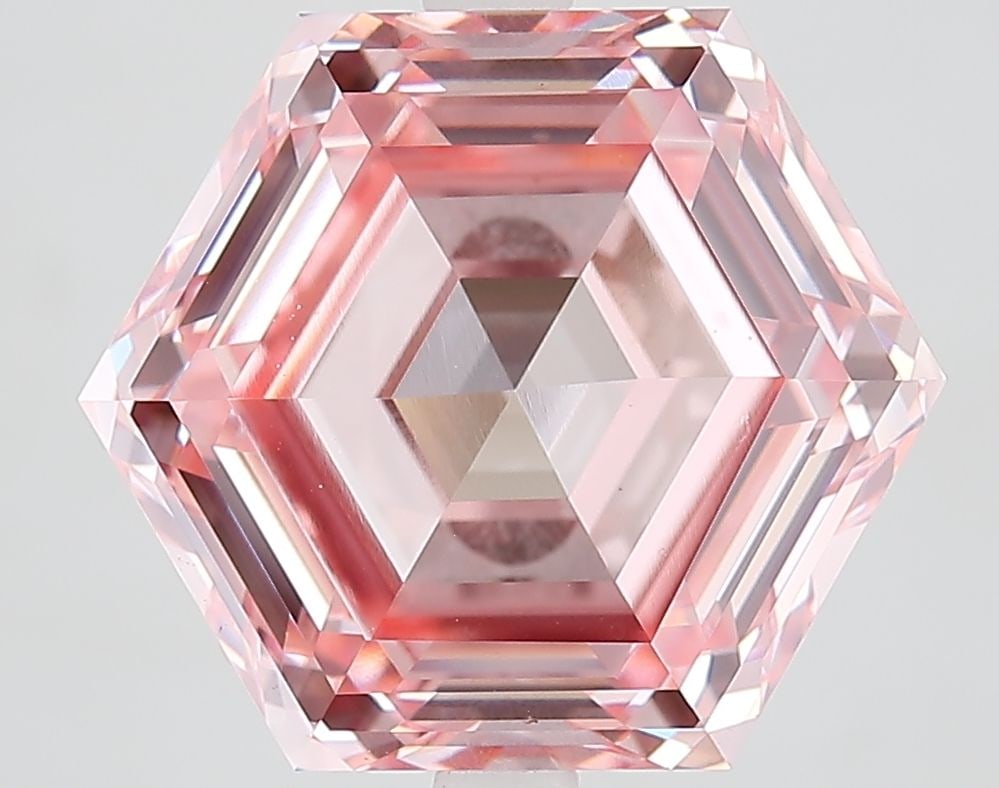 Loose Diamond - HEXAGONAL 7.05ct Fancy Vivid Pink VVS2: Loose Diamond - HEXAGONAL 7.05ct Fancy Vivid Pink VVS2 Source: This is a real non-mined Diamond that has been grown in a lab Shape: HEXAGONAL Carats: 7.05 Color: Fancy Vivid Pink Certification: IGI