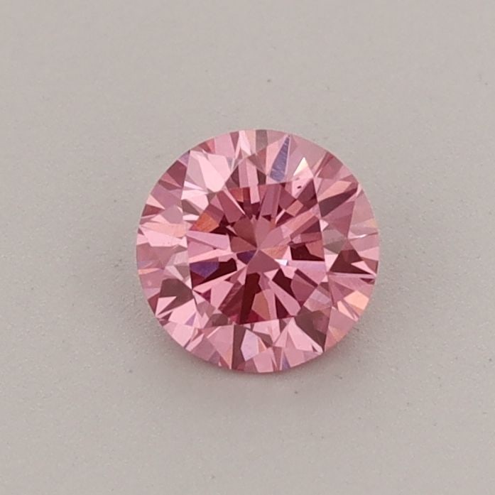 Loose Diamond - ROUND 0.4ct Fancy Vivid Pink VS1: Loose Diamond - ROUND 0.4ct Fancy Vivid Pink VS1 Source: This is a real non-mined Diamond that has been grown in a lab Shape: ROUND Carats: 0.4 Color: Fancy Vivid Pink Certification: IGI Video: