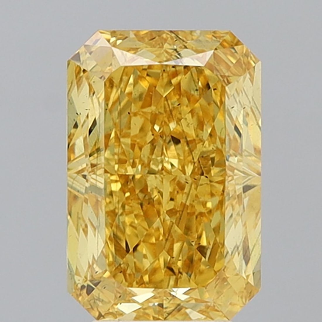 Loose Diamond - RADIANT 5.02ct Fancy Vivid Yellow SI1: Loose Diamond - RADIANT 5.02ct Fancy Vivid Yellow SI1 Source: This is a real non-mined Diamond that has been grown in a lab Shape: RADIANT Carats: 5.02 Color: Fancy Vivid Yellow Certification: IGI PLE