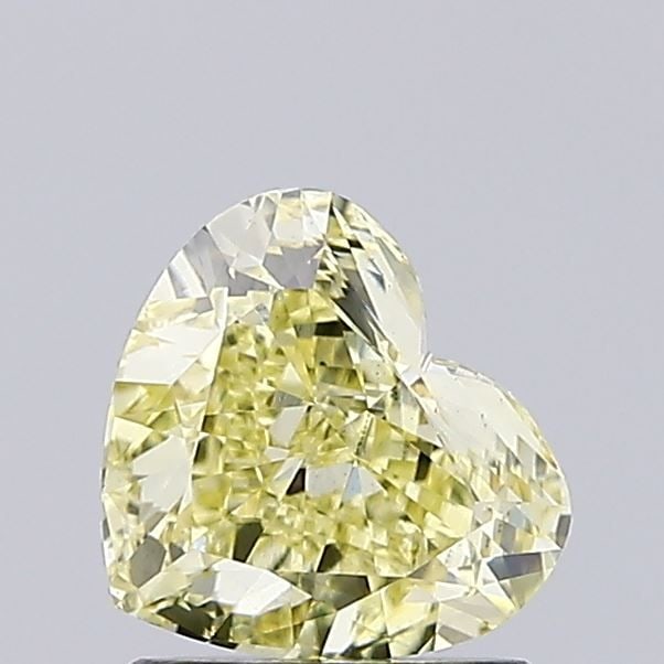 Loose Diamond - HEART 1.06ct Fancy Light Yellow VS1: Loose Diamond - HEART 1.06ct Fancy Light Yellow VS1 Source: This is a real non-mined Diamond that has been grown in a lab Shape: HEART Carats: 1.06 Color: Fancy Light Yellow Certification: IGI Video: