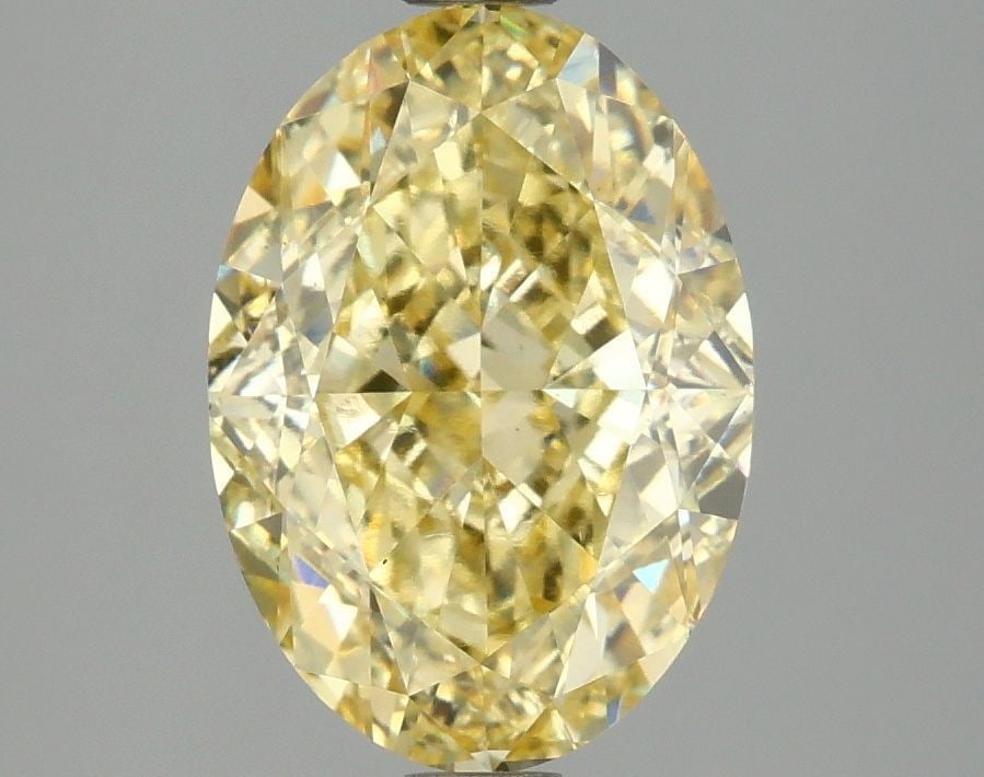 Loose Diamond - OVAL 3.1ct Fancy Vivid Yellow VS1: Loose Diamond - OVAL 3.1ct Fancy Vivid Yellow VS1 Source: This is a real non-mined Diamond that has been grown in a lab Shape: OVAL Carats: 3.1 Color: Fancy Vivid Yellow Certification: IGI Video: