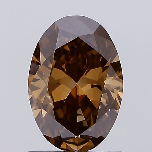 Loose Diamond - OVAL 1.1ct Fancy Brown VS1: Loose Diamond - OVAL 1.1ct Fancy Brown VS1 Source: This is a real non-mined Diamond that has been grown in a lab Shape: OVAL Carats: 1.1 Color: Fancy Brown Certification: IGI Video:
