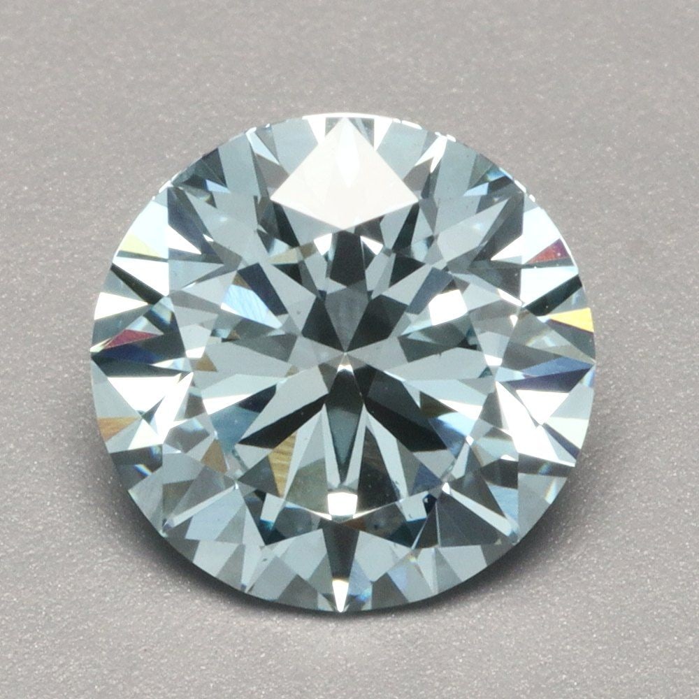 Ideal Loose Diamond - ROUND 1.53ct Fancy Vivid Blue VS2: Ideal Loose Diamond - ROUND 1.53ct Fancy Vivid Blue VS2 Source: This is a real non-mined Diamond that has been grown in a lab Shape: ROUND Carats: 1.53 Color: Fancy Vivid Blue Certification: IGI Video