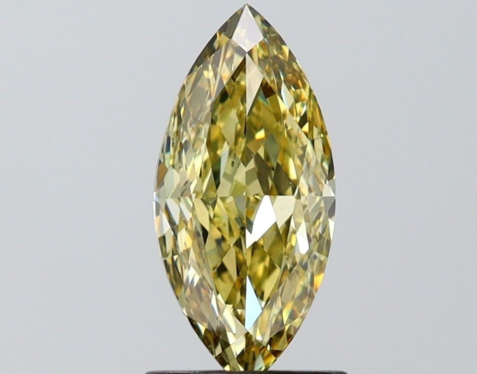 Loose Diamond - MARQUISE 1.39ct Fancy Yellow VVS2: Loose Diamond - MARQUISE 1.39ct Fancy Yellow VVS2 Source: This is a real non-mined Diamond that has been grown in a lab Shape: MARQUISE Carats: 1.39 Color: Fancy Yellow Certification: IGI Video: