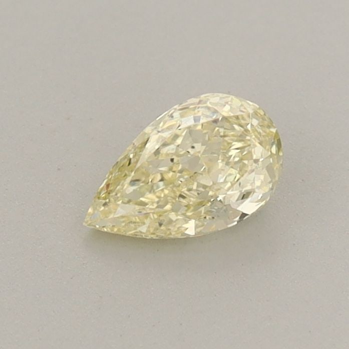 Loose Diamond - PEAR 0.34ct Fancy Light Yellow VS2: Loose Diamond - PEAR 0.34ct Fancy Light Yellow VS2 Source: This is a real non-mined Diamond that has been grown in a lab Shape: PEAR Carats: 0.34 Color: Fancy Light Yellow Certification: IGI Video: