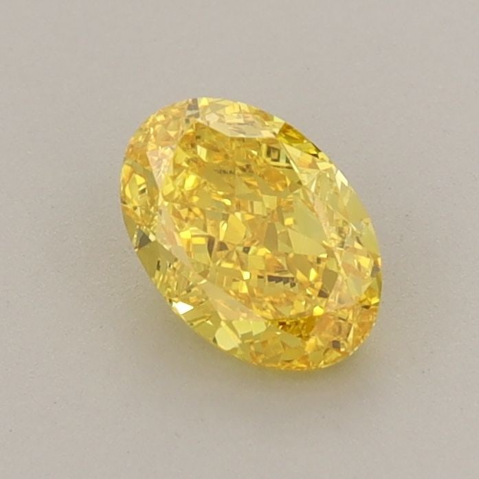 Loose Diamond - OVAL 0.72ct Fancy Vivid Yellow VVS2: Loose Diamond - OVAL 0.72ct Fancy Vivid Yellow VVS2 Source: This is a real non-mined Diamond that has been grown in a lab Shape: OVAL Carats: 0.72 Color: Fancy Vivid Yellow Certification: IGI Video: