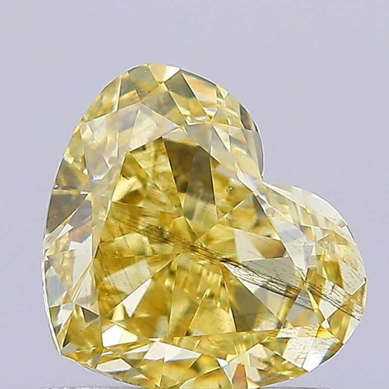 Loose Diamond - HEART 1.01ct Fancy Intense Yellow SI2: Loose Diamond - HEART 1.01ct Fancy Intense Yellow SI2 Source: This is a real non-mined Diamond that has been grown in a lab Shape: HEART Carats: 1.01 Color: Fancy Intense Yellow Certification: IGI Vid