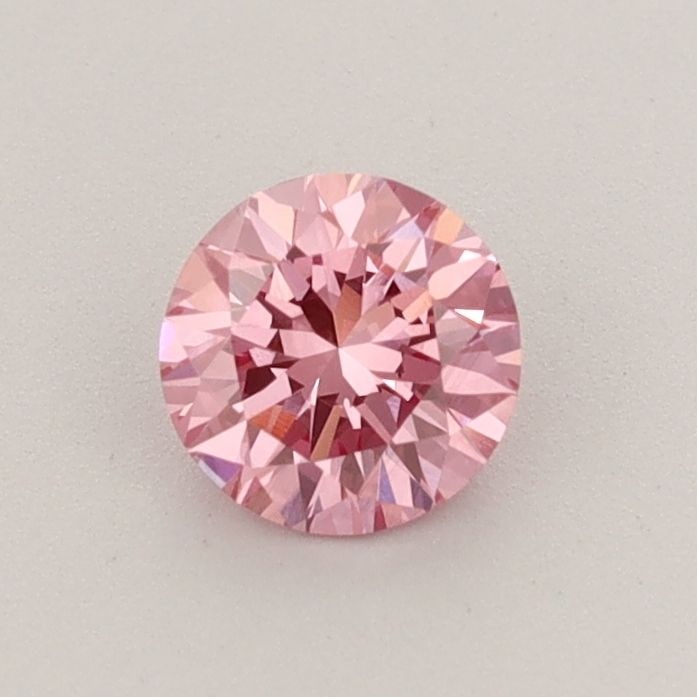 Loose Diamond - ROUND 0.48ct Fancy Vivid Pink VS2: Loose Diamond - ROUND 0.48ct Fancy Vivid Pink VS2 Source: This is a real non-mined Diamond that has been grown in a lab Shape: ROUND Carats: 0.48 Color: Fancy Vivid Pink Certification: IGI Video: