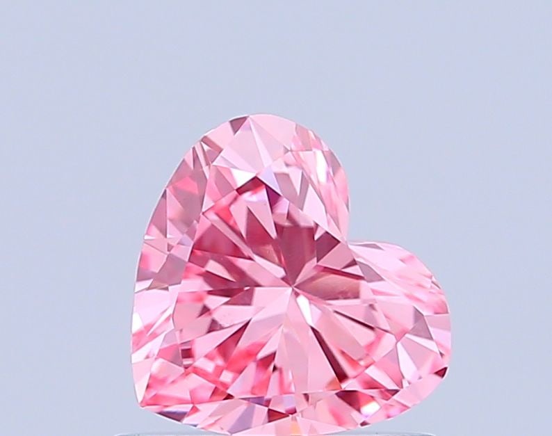 Loose Diamond - HEART 0.63ct Fancy Vivid Pink VS1: Loose Diamond - HEART 0.63ct Fancy Vivid Pink VS1 Source: This is a real non-mined Diamond that has been grown in a lab Shape: HEART Carats: 0.63 Color: Fancy Vivid Pink Certification: IGI Video: