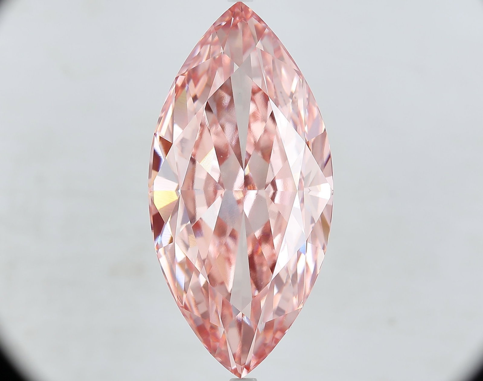 Loose Diamond - MARQUISE 20.27ct Fancy Vivid Pink VVS2: Loose Diamond - MARQUISE 20.27ct Fancy Vivid Pink VVS2 Source: This is a real non-mined Diamond that has been grown in a lab Shape: MARQUISE Carats: 20.27 Color: Fancy Vivid Pink Certification: IGI Vi