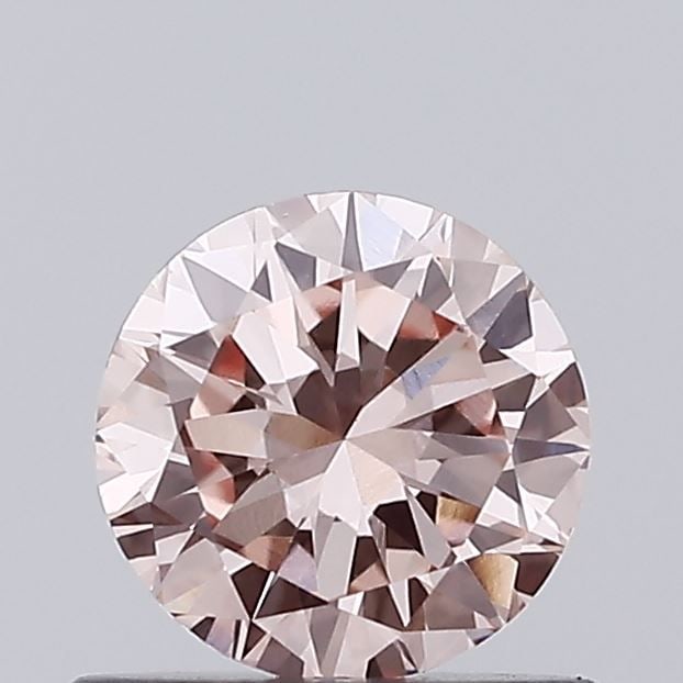 Loose Diamond - ROUND 0.62ct Fancy Pink VVS2: Loose Diamond - ROUND 0.62ct Fancy Pink VVS2 Source: This is a real non-mined Diamond that has been grown in a lab Shape: ROUND Carats: 0.62 Color: Fancy Pink Certification: IGI Video: