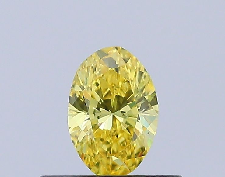 Loose Diamond - OVAL 0.3ct Fancy Vivid Yellow VVS1: Loose Diamond - OVAL 0.3ct Fancy Vivid Yellow VVS1 Source: This is a real non-mined Diamond that has been grown in a lab Shape: OVAL Carats: 0.3 Color: Fancy Vivid Yellow Certification: IGI Video: