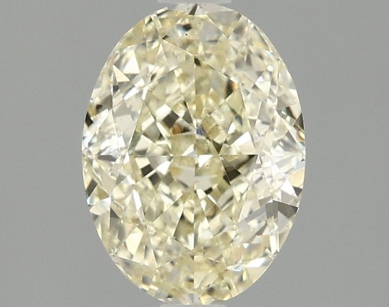 Loose Diamond - OVAL 2.1ct Fancy Intense Yellow VS2: Loose Diamond - OVAL 2.1ct Fancy Intense Yellow VS2 Source: This is a real non-mined Diamond that has been grown in a lab Shape: OVAL Carats: 2.1 Color: Fancy Intense Yellow Certification: IGI Video: