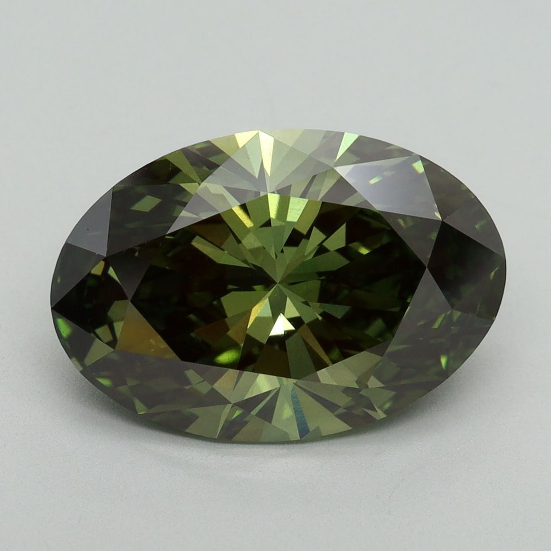 Loose Diamond - OVAL 5.71ct Fancy Vivid Green VS1: Loose Diamond - OVAL 5.71ct Fancy Vivid Green VS1 Source: This is a real non-mined Diamond that has been grown in a lab Shape: OVAL Carats: 5.71 Color: Fancy Vivid Green Certification: IGI Video: