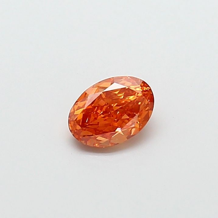 Loose Diamond - OVAL 0.81ct Fancy Vivid Pinkish Orange VS1: Loose Diamond - OVAL 0.81ct Fancy Vivid Pinkish Orange VS1 Source: This is a real non-mined Diamond that has been grown in a lab Shape: OVAL Carats: 0.81 Color: Fancy Vivid Pinkish Orange Certificatio
