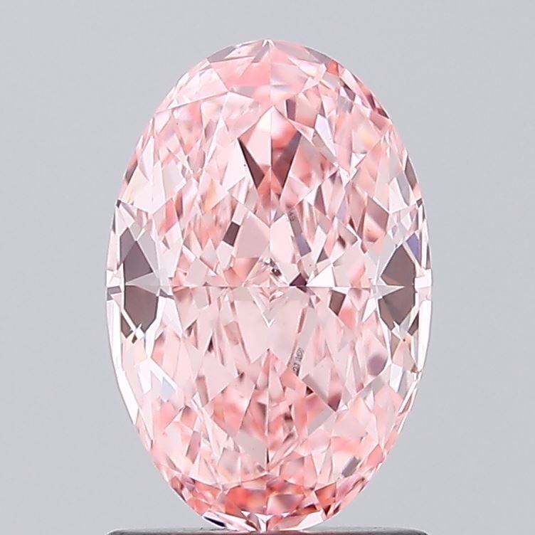 Loose Diamond - OVAL 1.37ct Fancy Vivid Pink VS1: Loose Diamond - OVAL 1.37ct Fancy Vivid Pink VS1 Source: This is a real non-mined Diamond that has been grown in a lab Shape: OVAL Carats: 1.37 Color: Fancy Vivid Pink Certification: IGI Video: