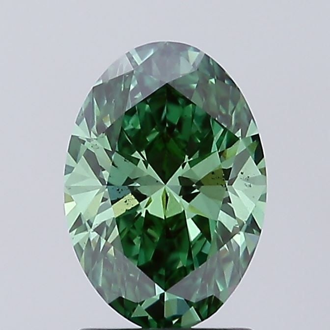 Loose Diamond - OVAL 1.53ct Fancy Vivid Green VS2: Loose Diamond - OVAL 1.53ct Fancy Vivid Green VS2 Source: This is a real non-mined Diamond that has been grown in a lab Shape: OVAL Carats: 1.53 Color: Fancy Vivid Green Certification: IGI Video: