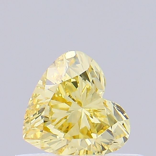 Loose Diamond - HEART 0.33ct Fancy Vivid Yellow VS2: Loose Diamond - HEART 0.33ct Fancy Vivid Yellow VS2 Source: This is a real non-mined Diamond that has been grown in a lab Shape: HEART Carats: 0.33 Color: Fancy Vivid Yellow Certification: NONE Video: