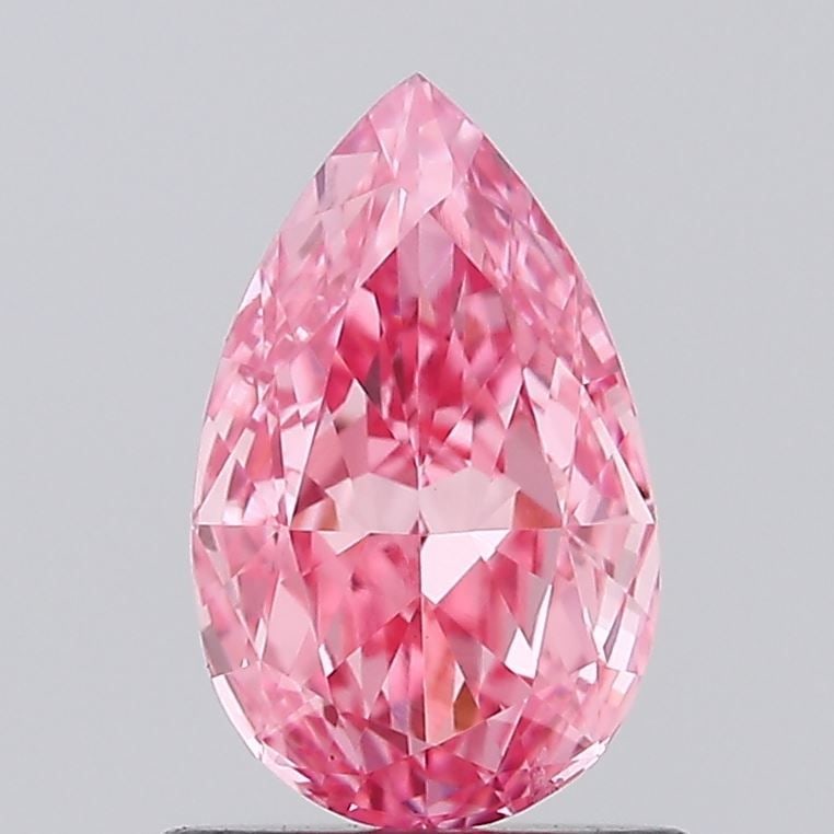 Loose Diamond - PEAR 0.97ct Fancy Vivid Pink VS2: Loose Diamond - PEAR 0.97ct Fancy Vivid Pink VS2 Source: This is a real non-mined Diamond that has been grown in a lab Shape: PEAR Carats: 0.97 Color: Fancy Vivid Pink Certification: IGI Video: