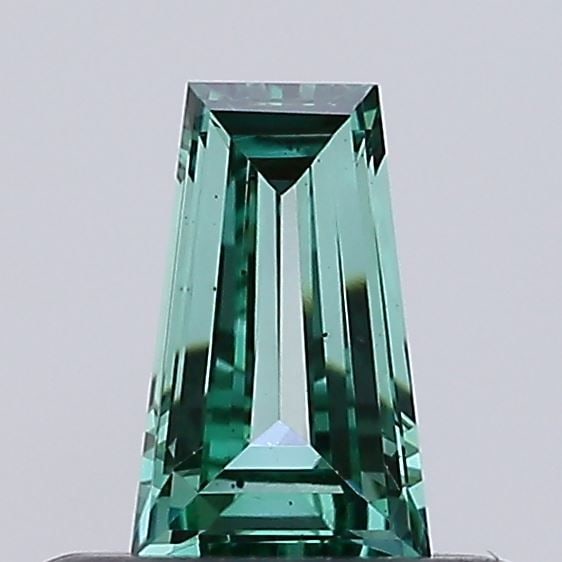 Loose Diamond - TAPERED BAGUETTE 0.27ct Fancy Vivid Green VS2: Loose Diamond - TAPERED BAGUETTE 0.27ct Fancy Vivid Green VS2 Source: This is a real non-mined Diamond that has been grown in a lab Shape: TAPERED BAGUETTE Carats: 0.27 Color: Fancy Vivid Green Certif