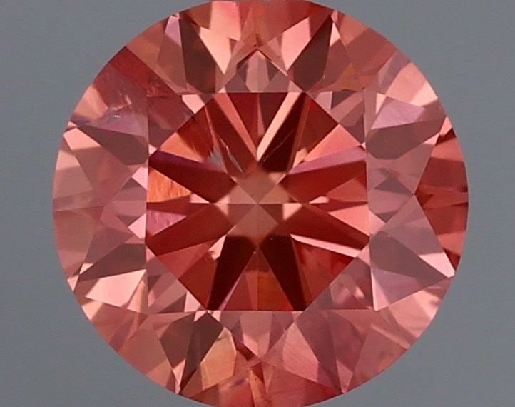 Loose Diamond - ROUND 0.55ct Fancy Vivid Purple Pink I1: Loose Diamond - ROUND 0.55ct Fancy Vivid Purple Pink I1 Source: This is a real non-mined Diamond that has been grown in a lab Shape: ROUND Carats: 0.55 Color: Fancy Vivid Purple Pink Certification: