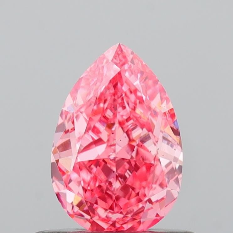 Loose Diamond - PEAR 0.66ct Fancy Vivid Pink SI1: Loose Diamond - PEAR 0.66ct Fancy Vivid Pink SI1 Source: This is a real non-mined Diamond that has been grown in a lab Shape: PEAR Carats: 0.66 Color: Fancy Vivid Pink Certification: IGI Video: