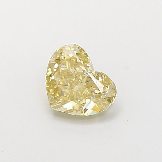 Loose Diamond - HEART 0.82ct Fancy Yellow VS2: Loose Diamond - HEART 0.82ct Fancy Yellow VS2 Source: This is a real non-mined Diamond that has been grown in a lab Shape: HEART Carats: 0.82 Color: Fancy Yellow Certification: IGI Video: