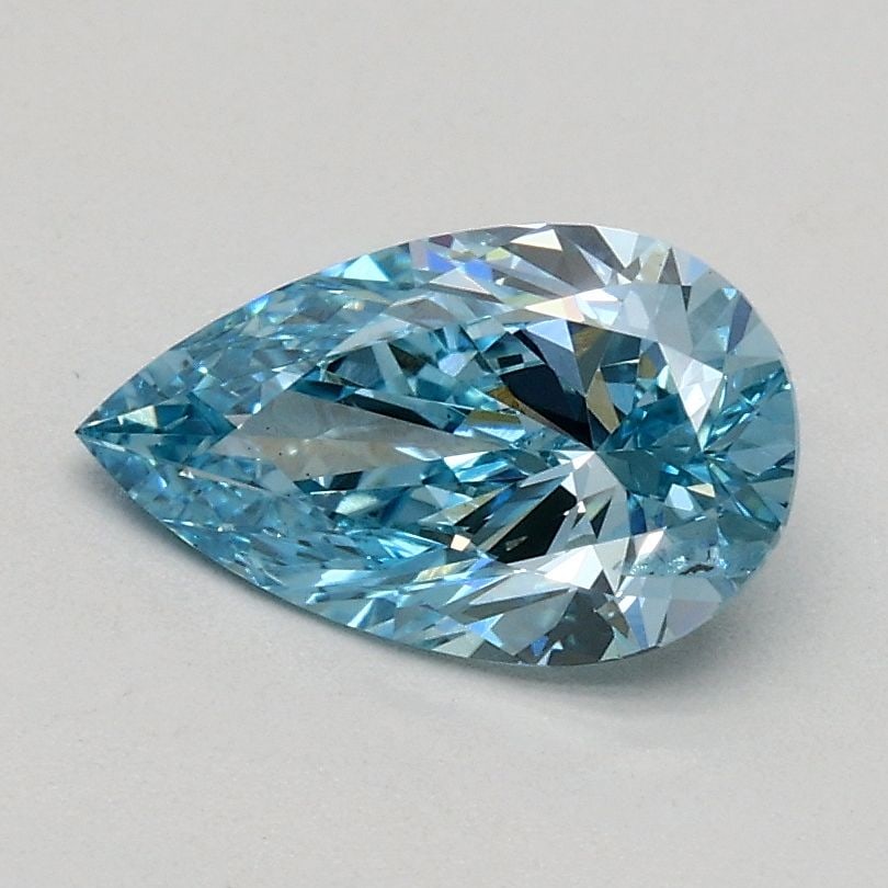 Loose Diamond - PEAR 0.71ct Fancy Vivid Blue SI2: Loose Diamond - PEAR 0.71ct Fancy Vivid Blue SI2 Source: This is a real non-mined Diamond that has been grown in a lab Shape: PEAR Carats: 0.71 Color: Fancy Vivid Blue Certification: IGI Video: