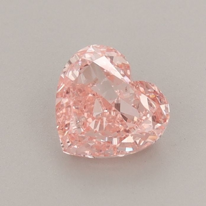 Loose Diamond - HEART 0.72ct Fancy Vivid Pink VS2: Loose Diamond - HEART 0.72ct Fancy Vivid Pink VS2 Source: This is a real non-mined Diamond that has been grown in a lab Shape: HEART Carats: 0.72 Color: Fancy Vivid Pink Certification: IGI Video: