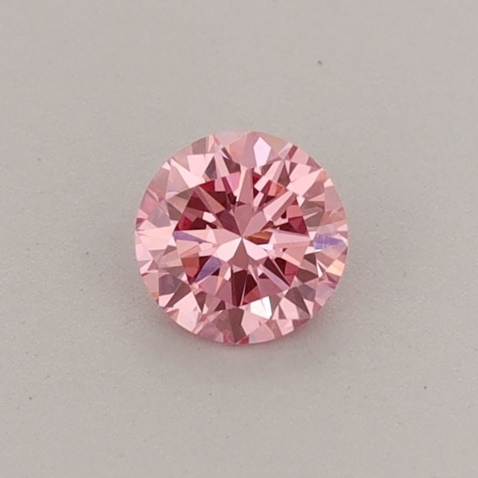 Loose Diamond - ROUND 0.3ct Fancy Vivid Pink VVS2: Loose Diamond - ROUND 0.3ct Fancy Vivid Pink VVS2 Source: This is a real non-mined Diamond that has been grown in a lab Shape: ROUND Carats: 0.3 Color: Fancy Vivid Pink Certification: IGI Video: