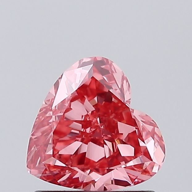 Loose Diamond - HEART 0.89ct Fancy Vivid Pink VS2: Loose Diamond - HEART 0.89ct Fancy Vivid Pink VS2 Source: This is a real non-mined Diamond that has been grown in a lab Shape: HEART Carats: 0.89 Color: Fancy Vivid Pink Certification: IGI Video: