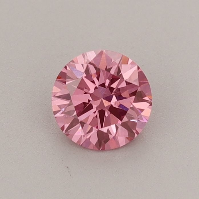 Ideal Loose Diamond - ROUND 0.43ct Fancy Vivid Pink VS1: Ideal Loose Diamond - ROUND 0.43ct Fancy Vivid Pink VS1 Source: This is a real non-mined Diamond that has been grown in a lab Shape: ROUND Carats: 0.43 Color: Fancy Vivid Pink Certification: IGI