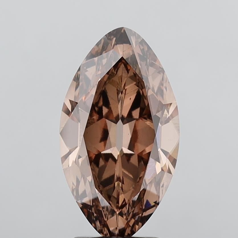Loose Diamond - MARQUISE 5.22ct Fancy Pinkish Brown VS1: Loose Diamond - MARQUISE 5.22ct Fancy Pinkish Brown VS1 Source: This is a real non-mined Diamond that has been grown in a lab Shape: MARQUISE Carats: 5.22 Color: Fancy Pinkish Brown Certification: