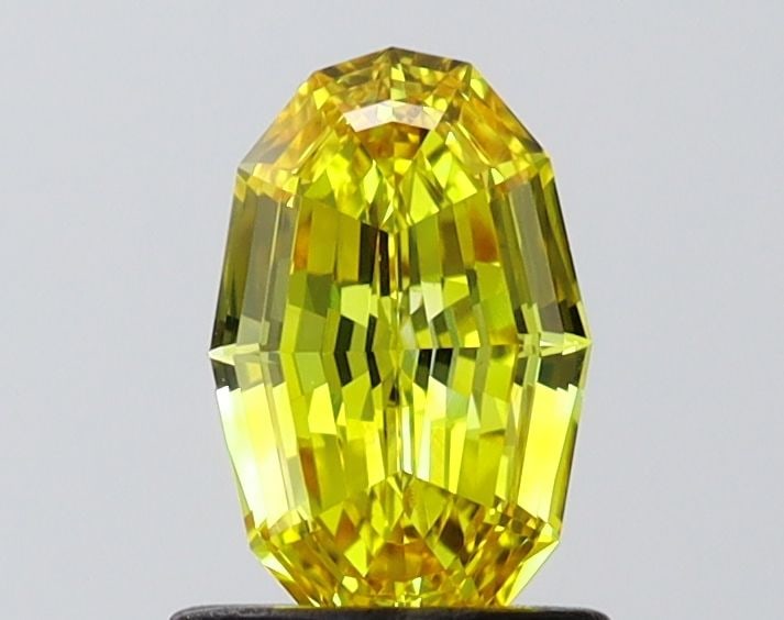 Loose Diamond - OVAL 0.91ct Fancy Vivid Yellow VVS2: Loose Diamond - OVAL 0.91ct Fancy Vivid Yellow VVS2 Source: This is a real non-mined Diamond that has been grown in a lab Shape: OVAL Carats: 0.91 Color: Fancy Vivid Yellow Certification: IGI Video: