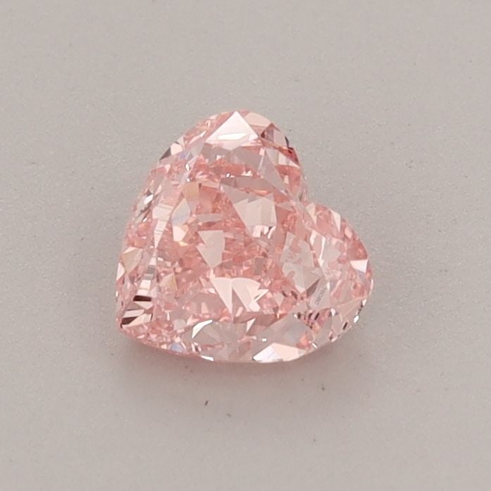 Loose Diamond - HEART 0.54ct Fancy Vivid Pink VS1: Loose Diamond - HEART 0.54ct Fancy Vivid Pink VS1 Source: This is a real non-mined Diamond that has been grown in a lab Shape: HEART Carats: 0.54 Color: Fancy Vivid Pink Certification: IGI Video: