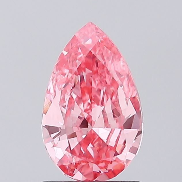 Loose Diamond - PEAR 1.0ct Fancy Vivid Pink VS1: Loose Diamond - PEAR 1.0ct Fancy Vivid Pink VS1 Source: This is a real non-mined Diamond that has been grown in a lab Shape: PEAR Carats: 1.0 Color: Fancy Vivid Pink Certification: IGI Video: