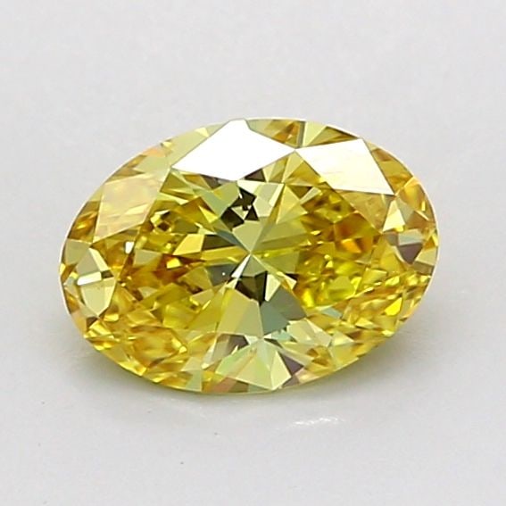 Loose Diamond - OVAL 0.71ct Fancy Yellow VS1: Loose Diamond - OVAL 0.71ct Fancy Yellow VS1 Source: This is a real non-mined Diamond that has been grown in a lab Shape: OVAL Carats: 0.71 Color: Fancy Yellow Certification: IGI Video: