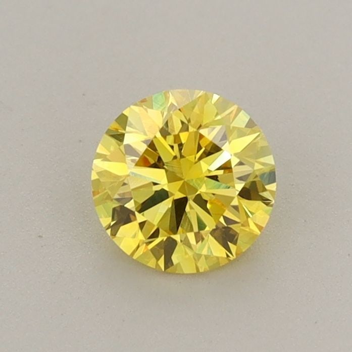 Ideal Loose Diamond - ROUND 0.49ct Fancy Vivid Yellow VVS2: Ideal Loose Diamond - ROUND 0.49ct Fancy Vivid Yellow VVS2 Source: This is a real non-mined Diamond that has been grown in a lab Shape: ROUND Carats: 0.49 Color: Fancy Vivid Yellow Certification: IGI 