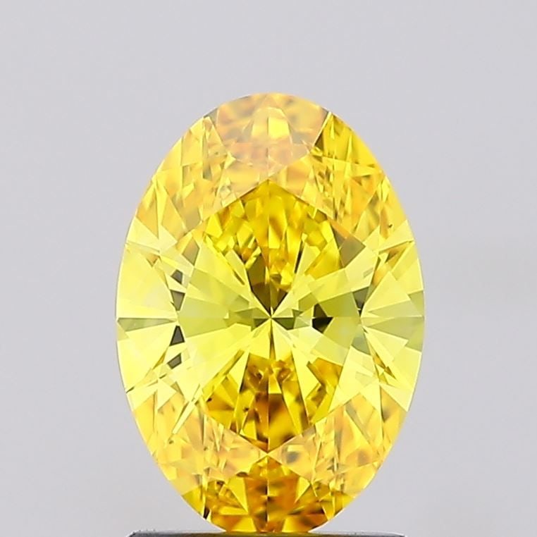Loose Diamond - OVAL 1.4ct Fancy Vivid Yellow VS1: Loose Diamond - OVAL 1.4ct Fancy Vivid Yellow VS1 Source: This is a real non-mined Diamond that has been grown in a lab Shape: OVAL Carats: 1.4 Color: Fancy Vivid Yellow Certification: IGI Video: