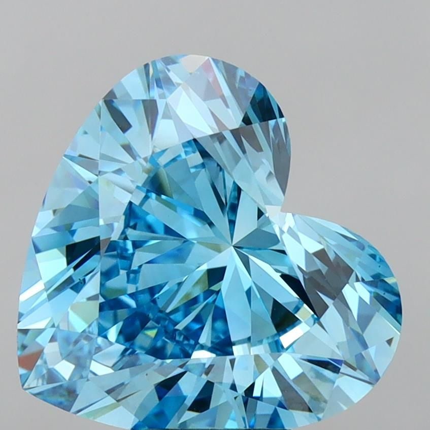 Loose Diamond - HEART 7.09ct Fancy Vivid Blue VS1: Loose Diamond - HEART 7.09ct Fancy Vivid Blue VS1 Source: This is a real non-mined Diamond that has been grown in a lab Shape: HEART Carats: 7.09 Color: Fancy Vivid Blue Certification: IGI Video: