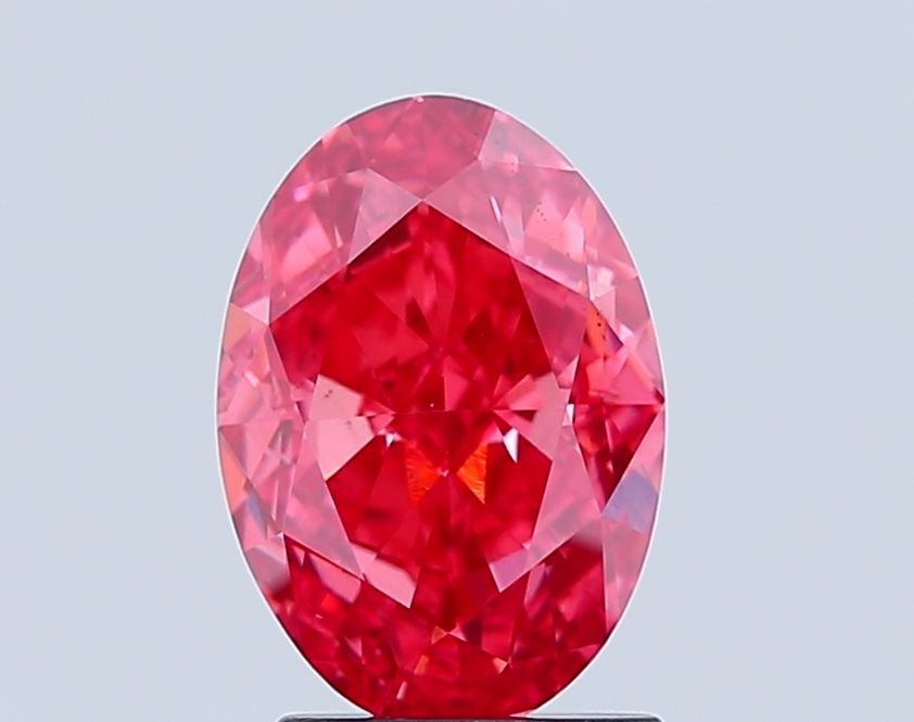 Loose Diamond - OVAL 2.36ct Fancy Vivid Pink VS2: Loose Diamond - OVAL 2.36ct Fancy Vivid Pink VS2 Source: This is a real non-mined Diamond that has been grown in a lab Shape: OVAL Carats: 2.36 Color: Fancy Vivid Pink Certification: IGI Video: